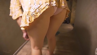 A Seductive Housewife Teases With Her Upskirt In The Bedroom